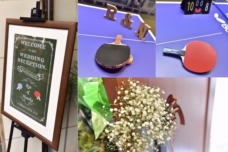 ウェルカムボードと卓球台と花